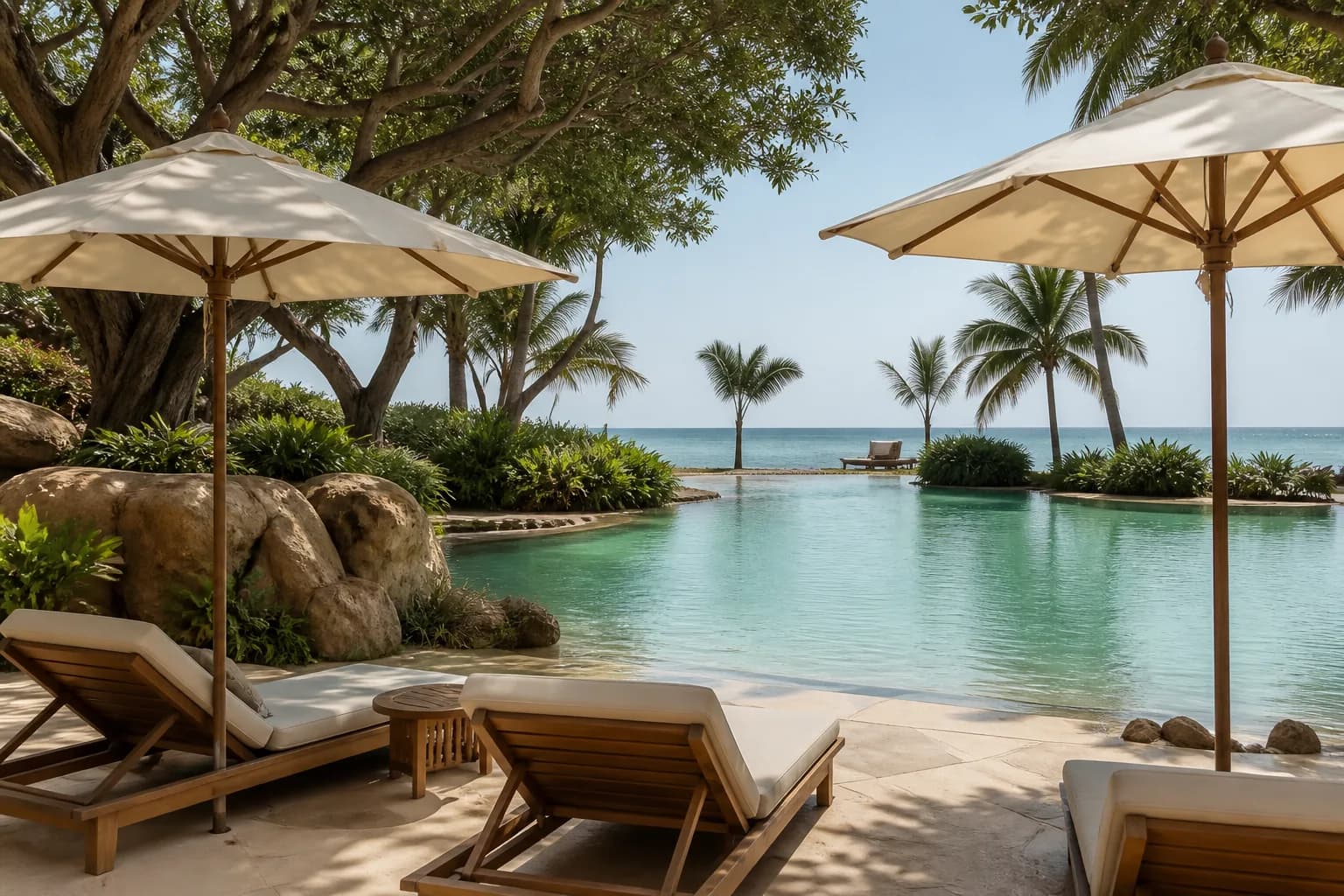 Lagoon-style pool with shaded seating at Lunaya Terraces, Saih Shuaib 1